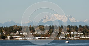 Houses near Squalicum Beach in Bellingham with Canadian Border Peaks in the background