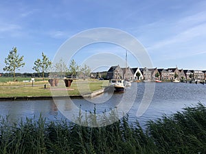 Houses next to a canal in balk