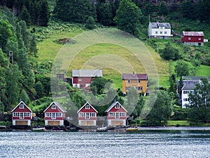 houses Norwegian village, fjord on a Sunny day