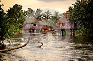 Houses over water, village Boca de Guama, Cuba