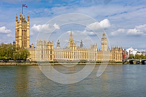 Houses of parliament and Big Ben tower with Thames river, London, UK