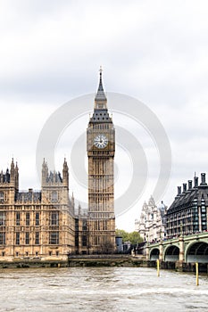 Houses of parliament with Big Ben tower and Westminster bridge in London, UK