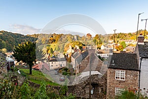 Houses in Richmond, North Yorkshire viewed from the castle walk with autumn colors