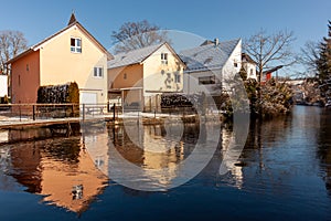 Houses by the river Wolfegger Ach in Baienfurt, Baden Wuerttemberg photo