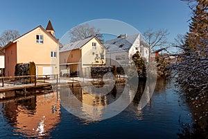 Houses by the river Wolfegger Ach in Baienfurt, Baden Wuerttemberg photo