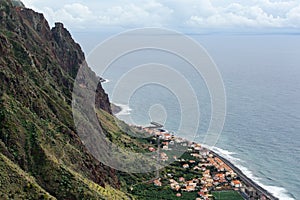 Houses and road on the ocean shore the island of Madeira.