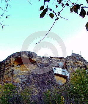 Houses on the rocks of the mountain in the village of Chiclana de Segura