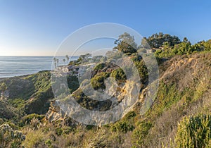 Houses on a rugged cliff overlooking the ocean at Del Mar Southern California