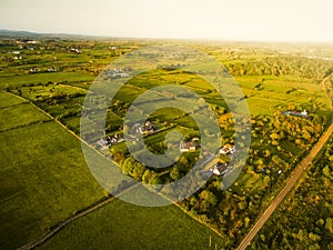 Houses in a rural village by Westport tow near the Irish Atlantic Coast.Greenery and real estate in Ireland concept. Agriculture