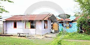 Houses with satellite antenna in Manokwari