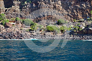 Houses between sea and mountain