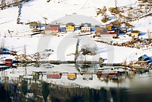 Houses on the shore of Sognefjord in winter. Norway, Europe