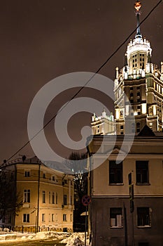 houses and skyscraper in Moscow city in night