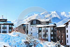 Houses and snow mountains panorama in Bansko, Bulgaria