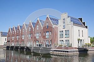 Houses with solar panels on the roof for alternative ener