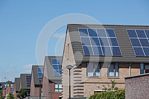 Houses with solar panels on the roof for alternative energy
