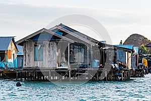 houses on stilts in Yellu village at sunset