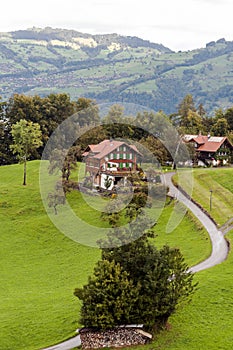 Houses surrounded by meadows