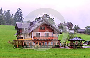 Houses surrounded by meadows