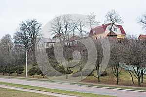 Houses on the top of the hill near the road