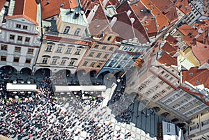 Houses with traditional red roofs in Prague Old Town Square in t