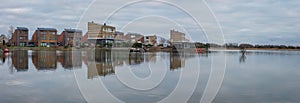 Houses by the water in  Heerhugowaard, modern dutch neighbourhood focused on carbon neutrality