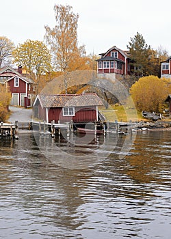 Houses by the water in Vaxholm, Stockholm archipelago photo