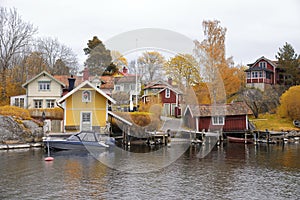 Houses by the water in Vaxholm, Stockholm archipelago photo