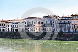 Houses on waterfronts in Verona city in spring