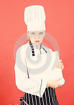 Housewife with cookery book. professional chef in kitchen. Cuisine. restaurant menu. Culinary dieting. woman in cook hat