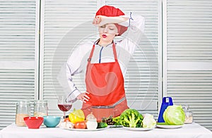 Housewife cooking and drink wine. Enjoy easy ideas for dinner. Woman enjoy cooking food. Housekeeping and culinary