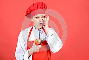 Housewife with cooking knife and onion. professional chef in kitchen crying. Cuisine. woman in cook hat and apron. happy