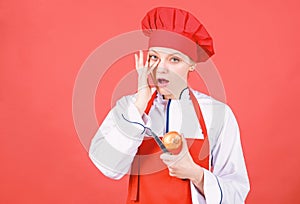 Housewife with cooking knife and onion. professional chef in kitchen crying. Cuisine. woman in cook hat and apron. happy