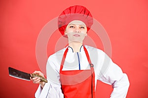Housewife with cooking knife. professional chef in kitchen. Cuisine. butcher cut meat. woman in cook hat and apron