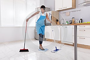 Housewife Doing Multitasking Household Work