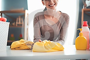 Housewife enjoying fresh laundry at home