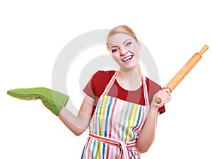 Housewife kitchen apron holds rolling pin showing copy space isolated