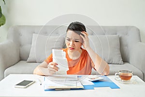 housewife manages family budget  accountant do paper work remote job at home concept photo