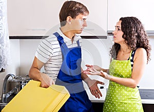 Housewife and plumber photo