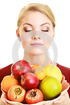 Housewife or seller offering healthy fruit isolated