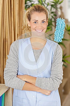 housewife using spray detergent