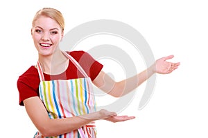 Housewife or waitress making inviting welcome gesture kitchen apron isolated