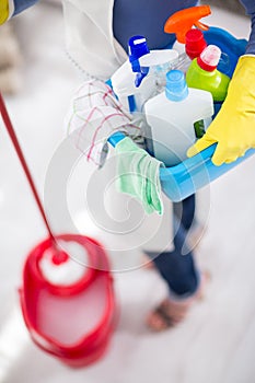 Housewife wears everything she needs for cleaning house photo