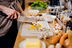 Housewife woman cutting fresh vegetables.Ingredients for cooking food with mushrooms.Healthy food for strong immune system.Health