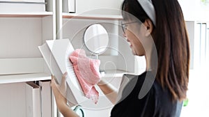 Housewives use towels to wipe things