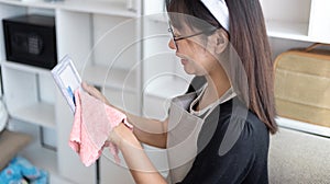 Housewives use towels to wipe things