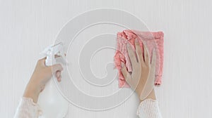 Housewives use towels to wipe things, tables, chairs, display cabinets and glass inside the house