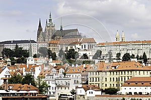 Housing along Vltava River.Prague Castle and Sct.Vitus Cathedral