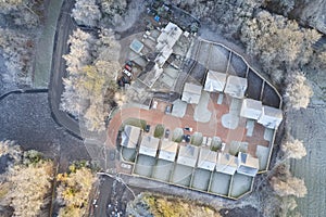 Housing development aerial view in construction on rural countryside site Scotland UK