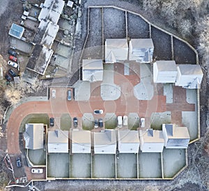 Housing development aerial view in construction on rural countryside site Scotland UK